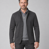 Blazer gris foncé pour homme, vue de face cadrée, porté ouvert avec col relevé et quatre boutons